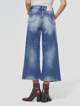 PATTI WIDE FLARED JEANS IN DISTRESSED BLUE - Woman